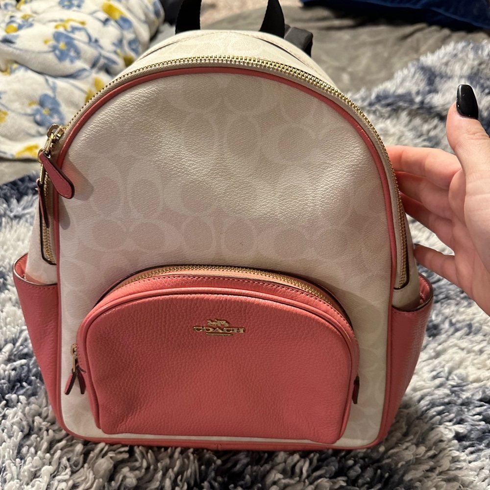 Pink and white coach mini backpack